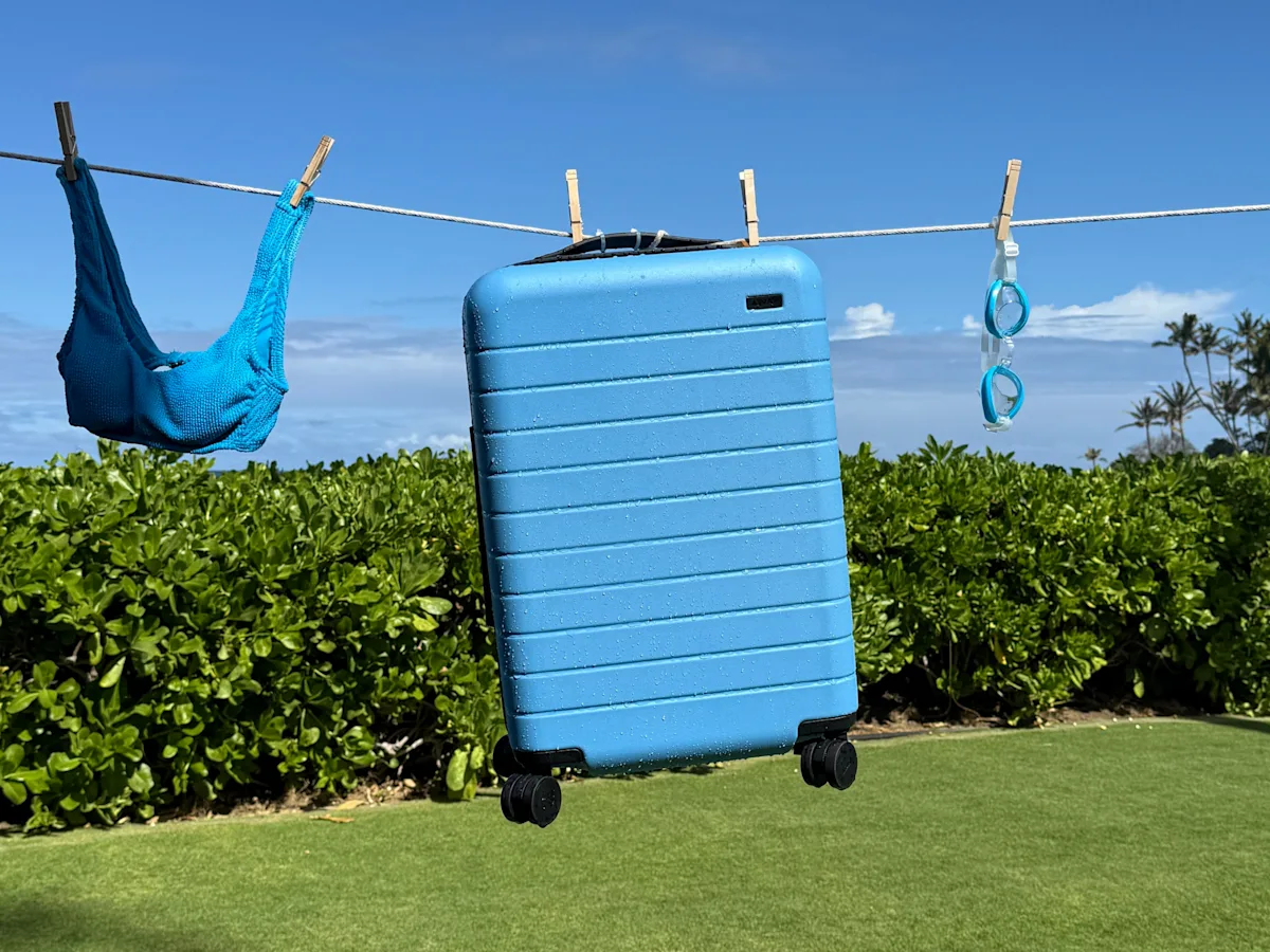 AWAY luggage brand, the blue travel luggage on a line. Blog topic: How AWAY,Instagram's favorite luggage brand, packed a marketing punch.