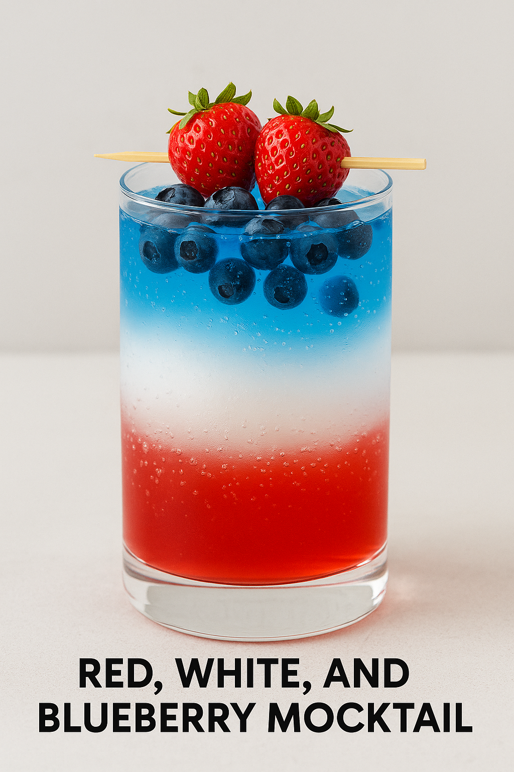 freedom mocktail. Blueberry juice Coconut milk Strawberry syrup Ice cubes